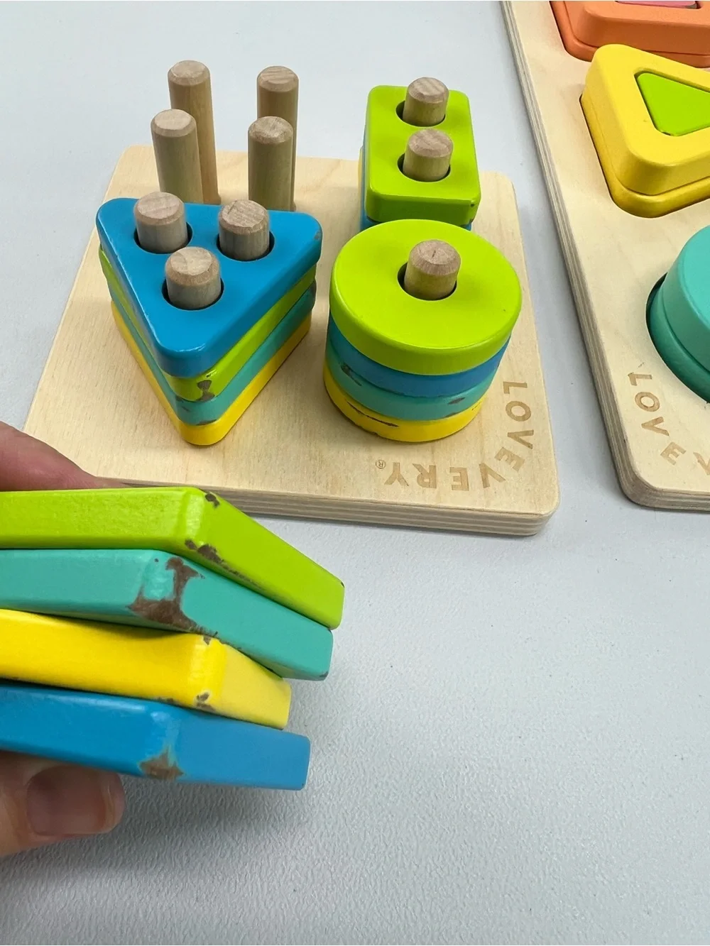 Lovevery Lot of 2 Puzzles Geo Shapes and Sort & Stack Peg Puzzle Montessori Toys
